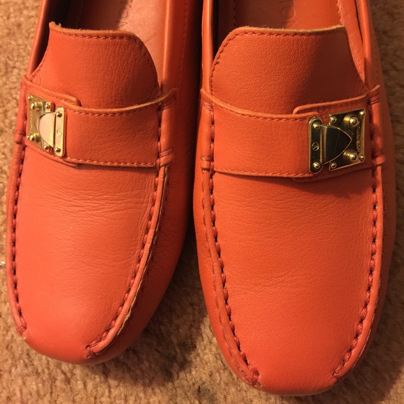 orange driving shoes