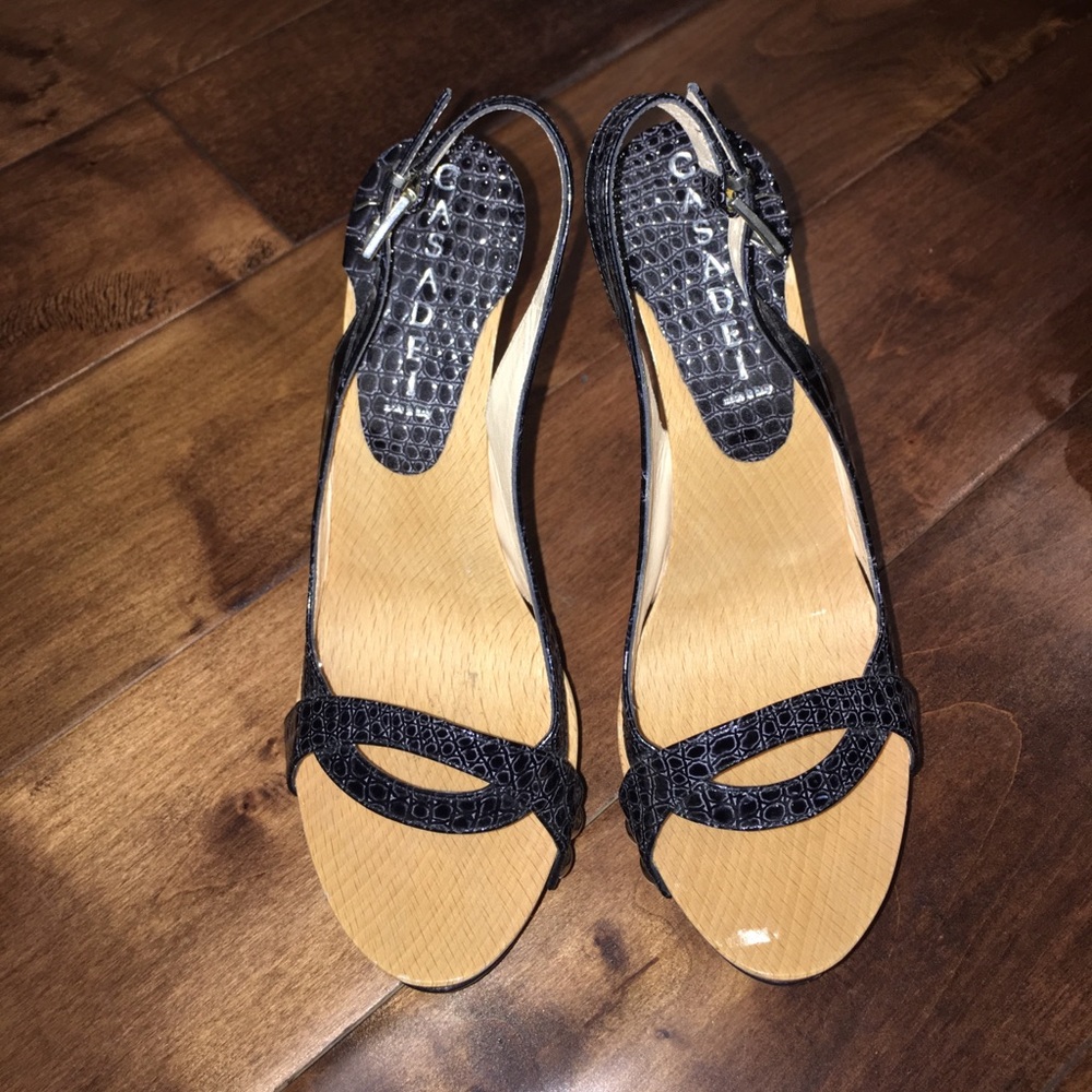 Casadei slight platform wood black and gold heels