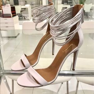 Aquazzura white leather and silver ankle strap.