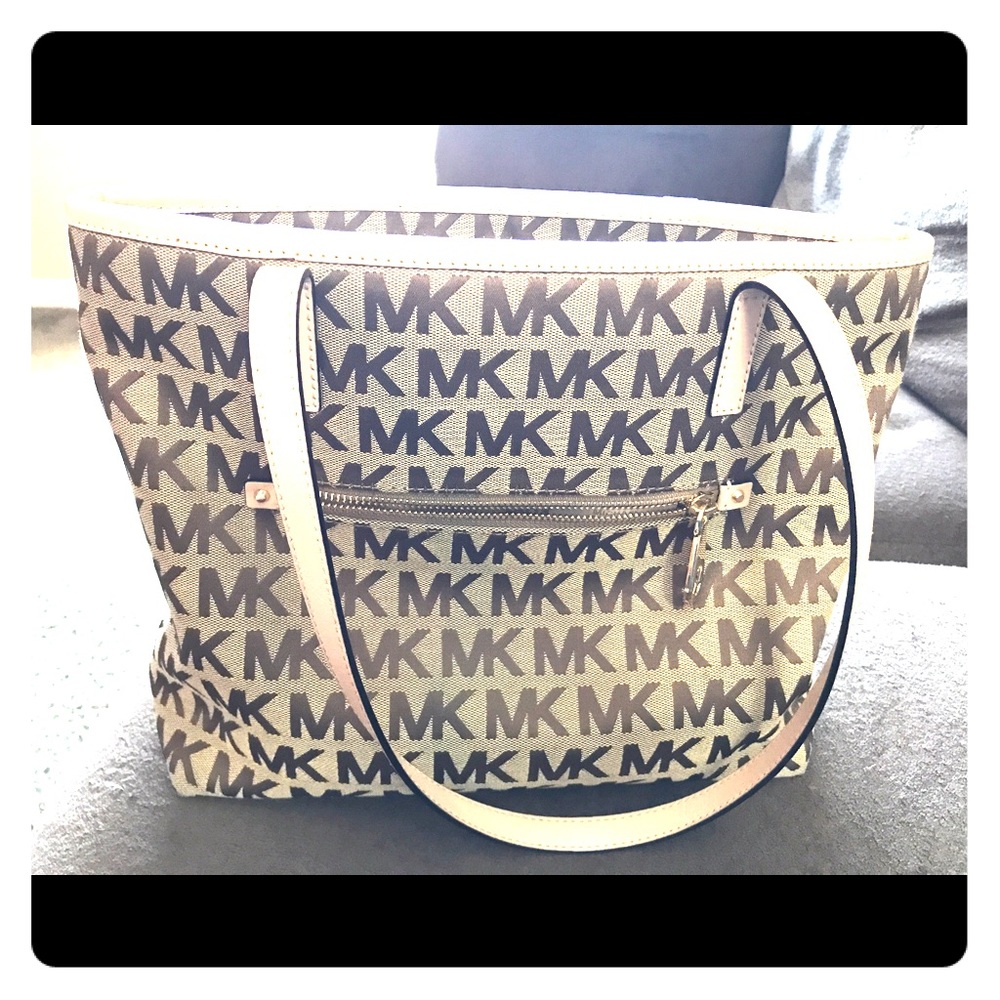 Brown and tan Micheal kors shoulder purse