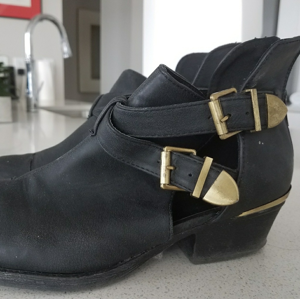 Black leather low heeled boots