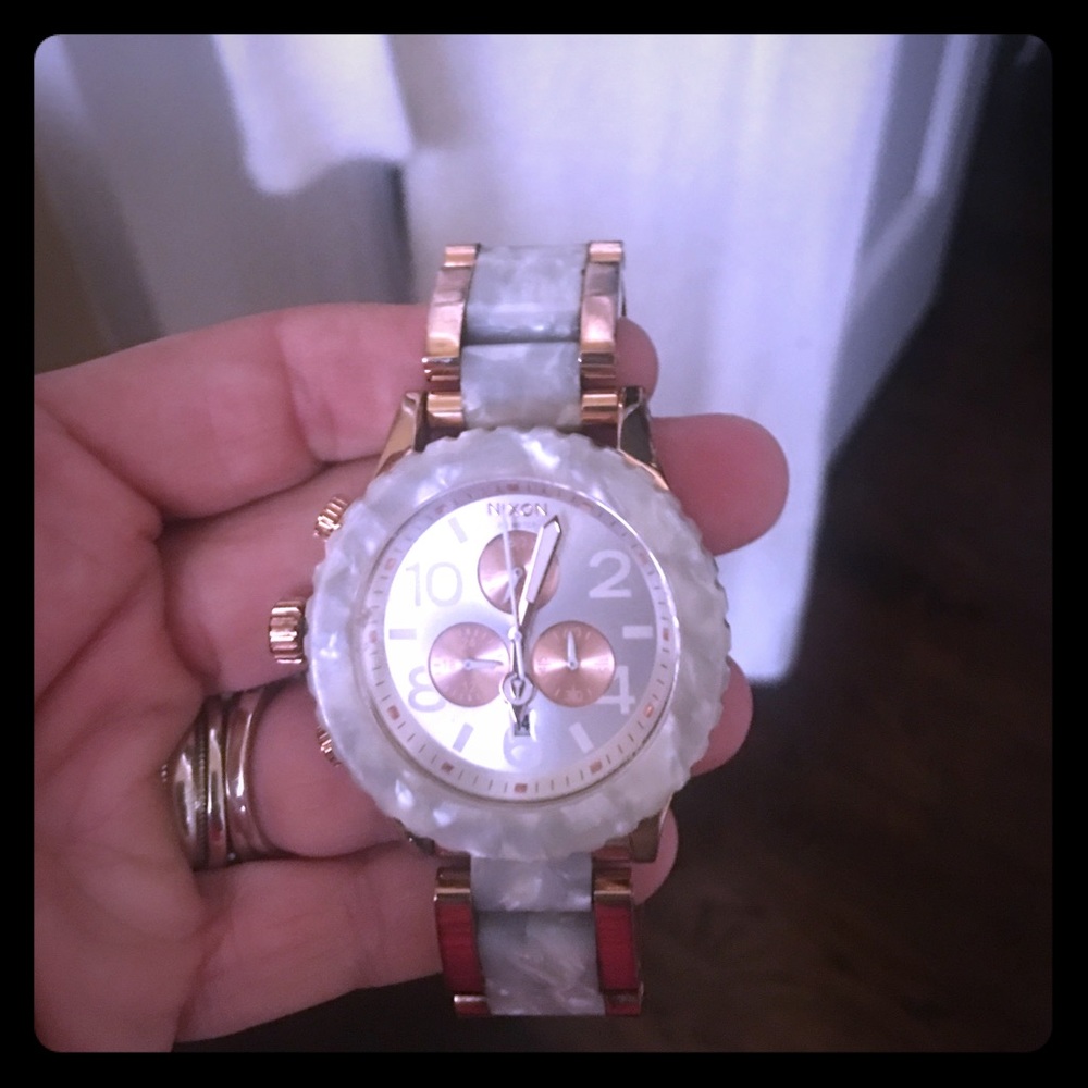 Women's rose gold Nixon left rare left hand watch