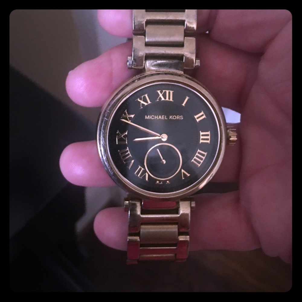 Michael Kors ladies gold watch with black face
