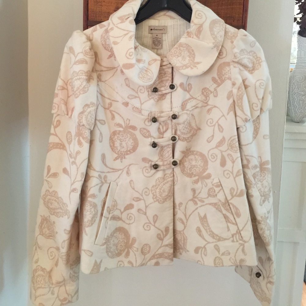 Cream Anthropologie jacket with tan floral pattern