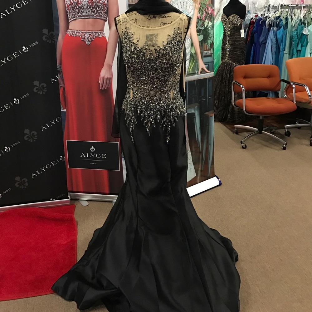 Gorgeous black dress with nude bodice.