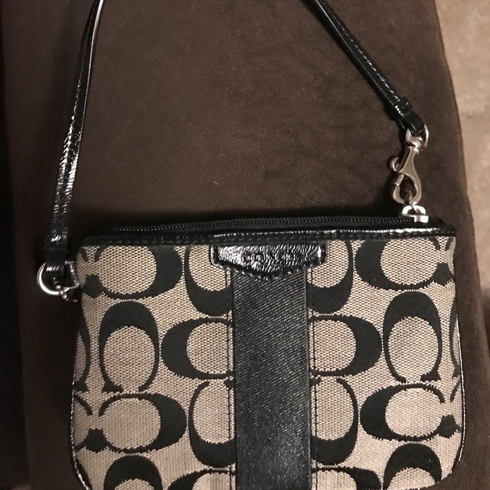 Black and grey coach wristlet