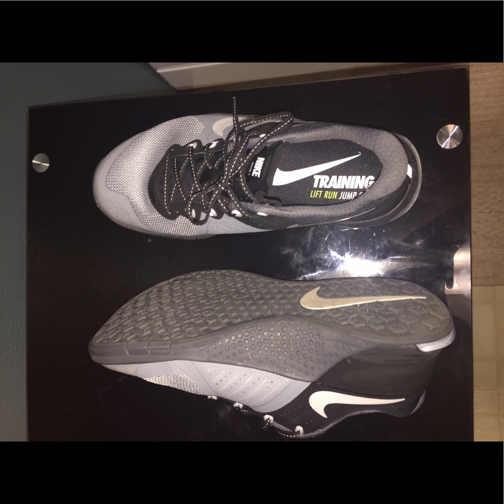 Black and grey Nike training shoes