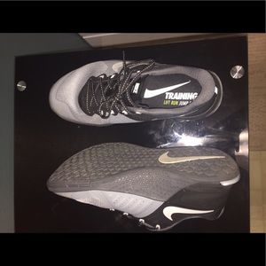 Black and grey Nike training shoes