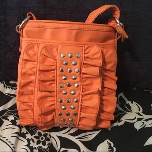 Orange spike purse