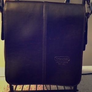 Brown leather Coach cross body purse