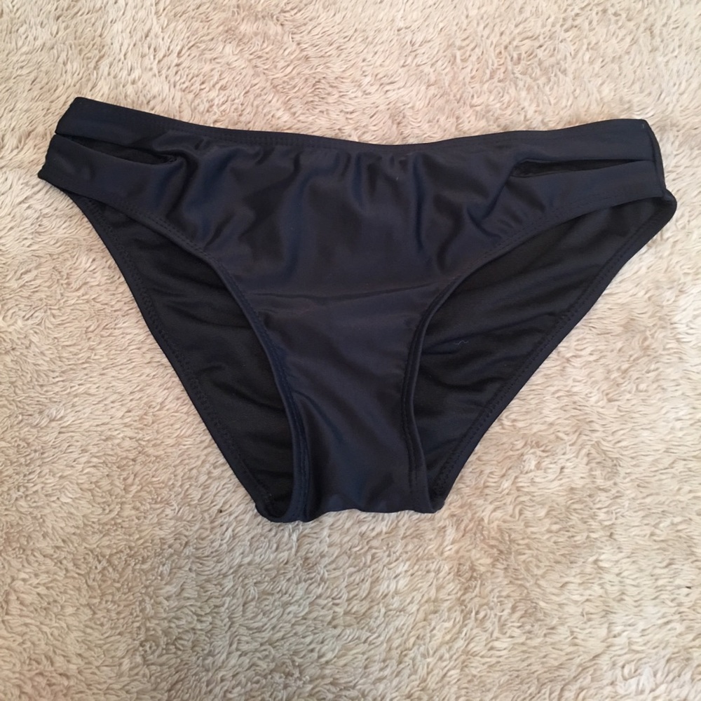 Black bikini bottoms with slits on front sides