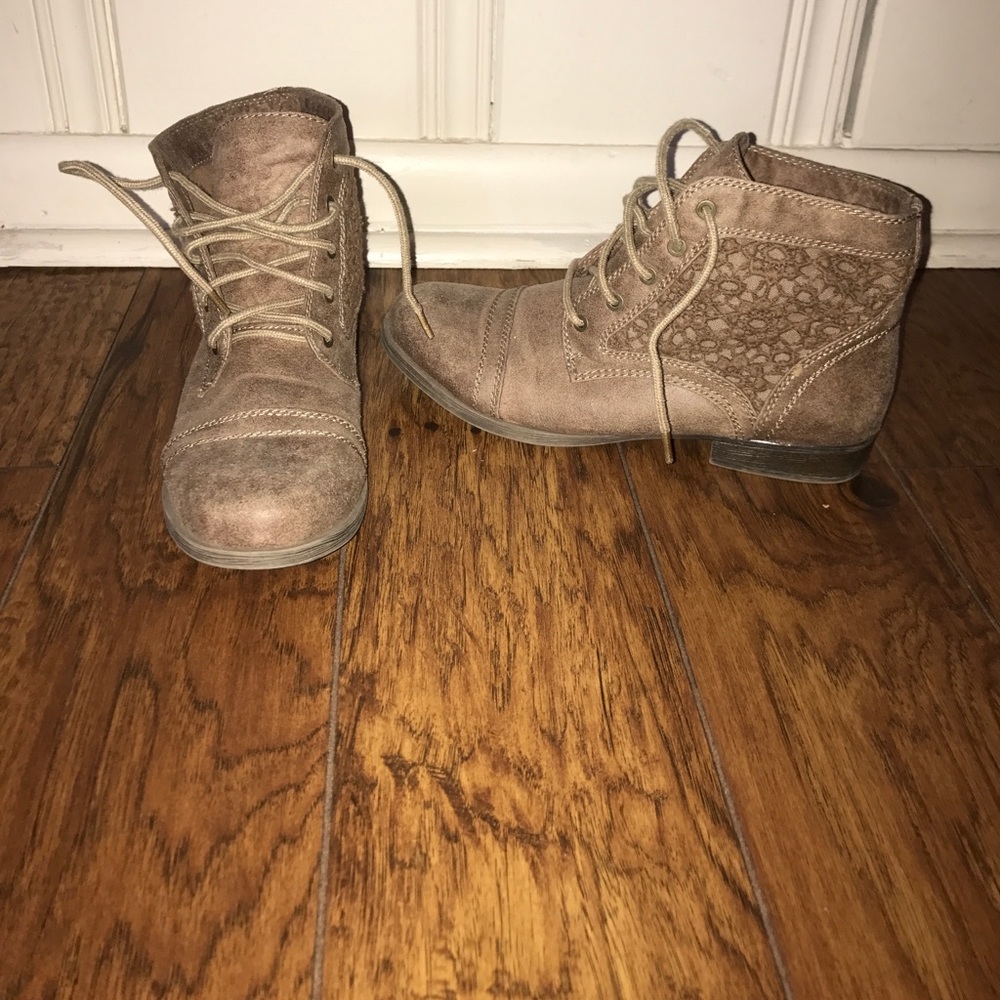 Brown combat boots with floral design on side