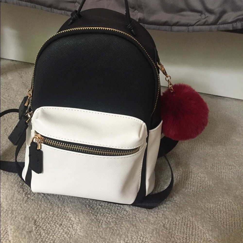 Mini white and black backpack