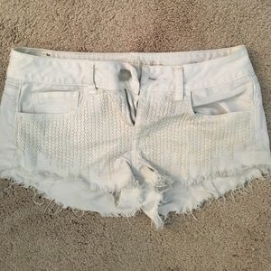 AE white sequenced jean shorts
