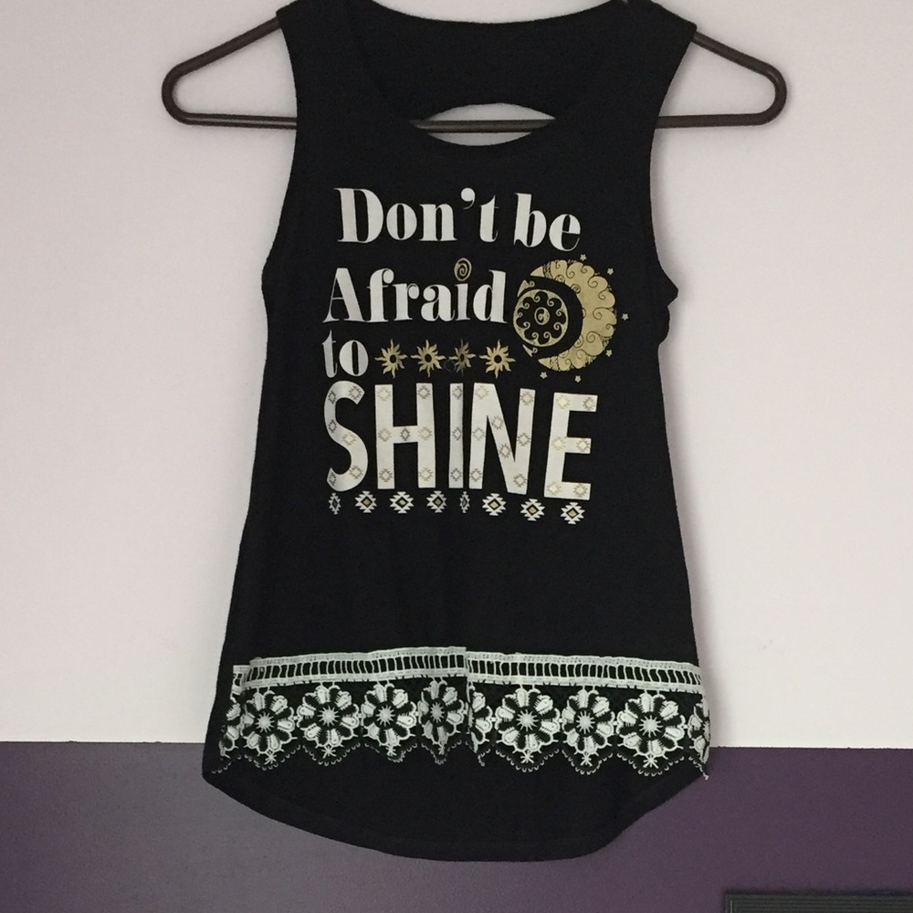 A tank top with motto 'Don't be Afraid to Shine'.