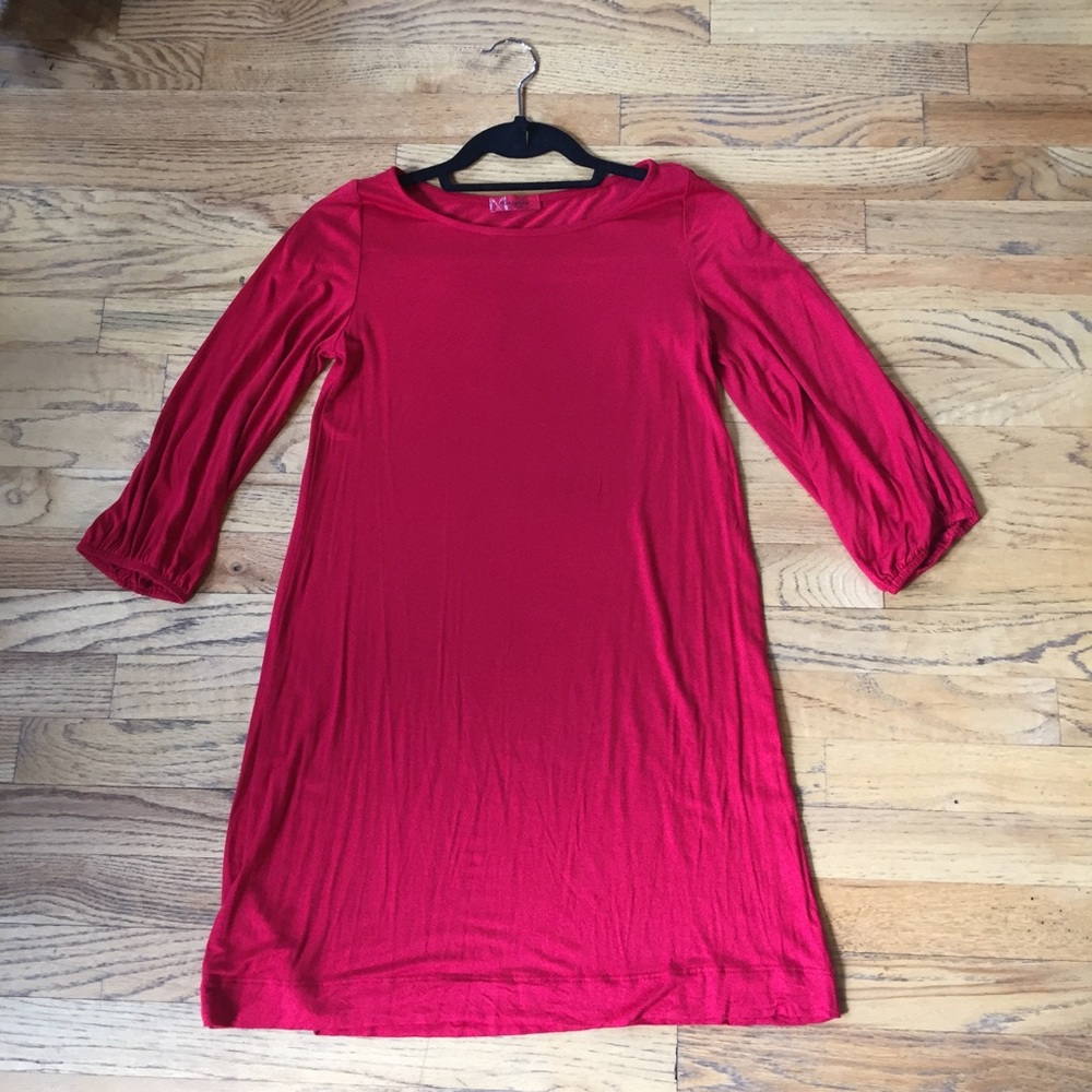 Poppy colored dress.