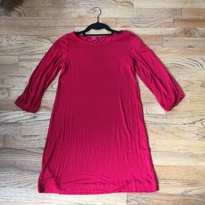 Poppy colored dress.