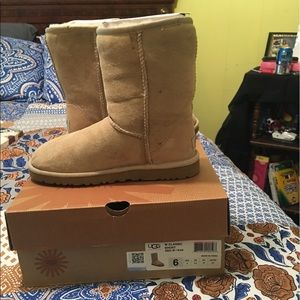 Ugg sand color boots.