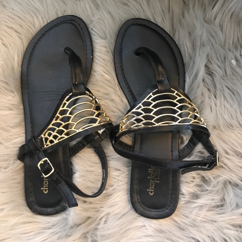 Gold and black sandals