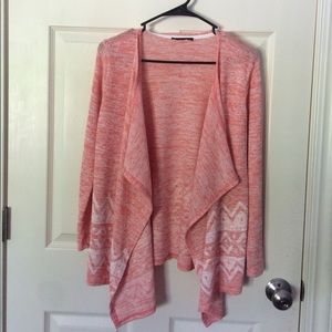 Pink long-sleeve cardigan with white design