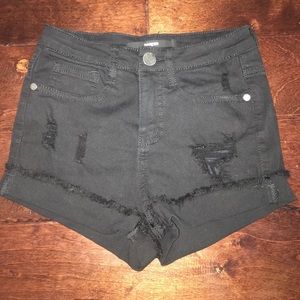 Size 25 black ripped shorts