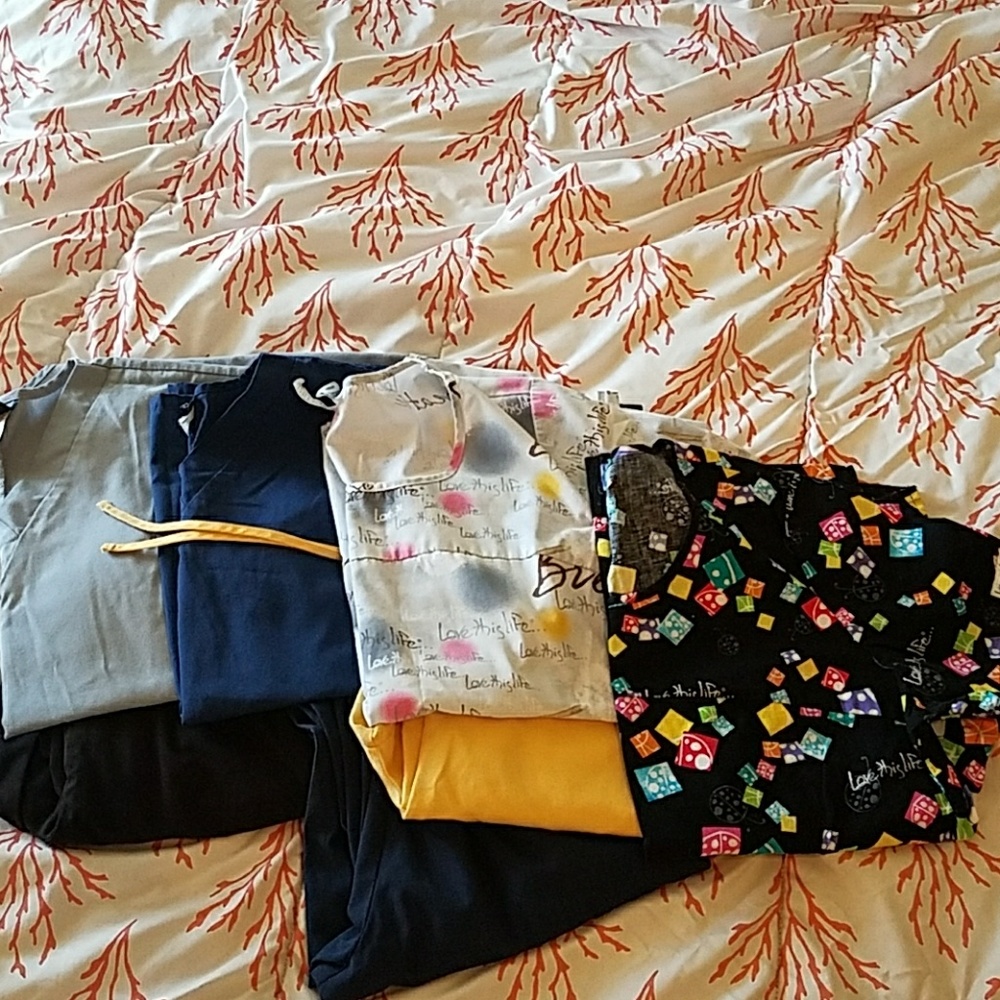 4 scrub tops/ 3 scrub bottoms