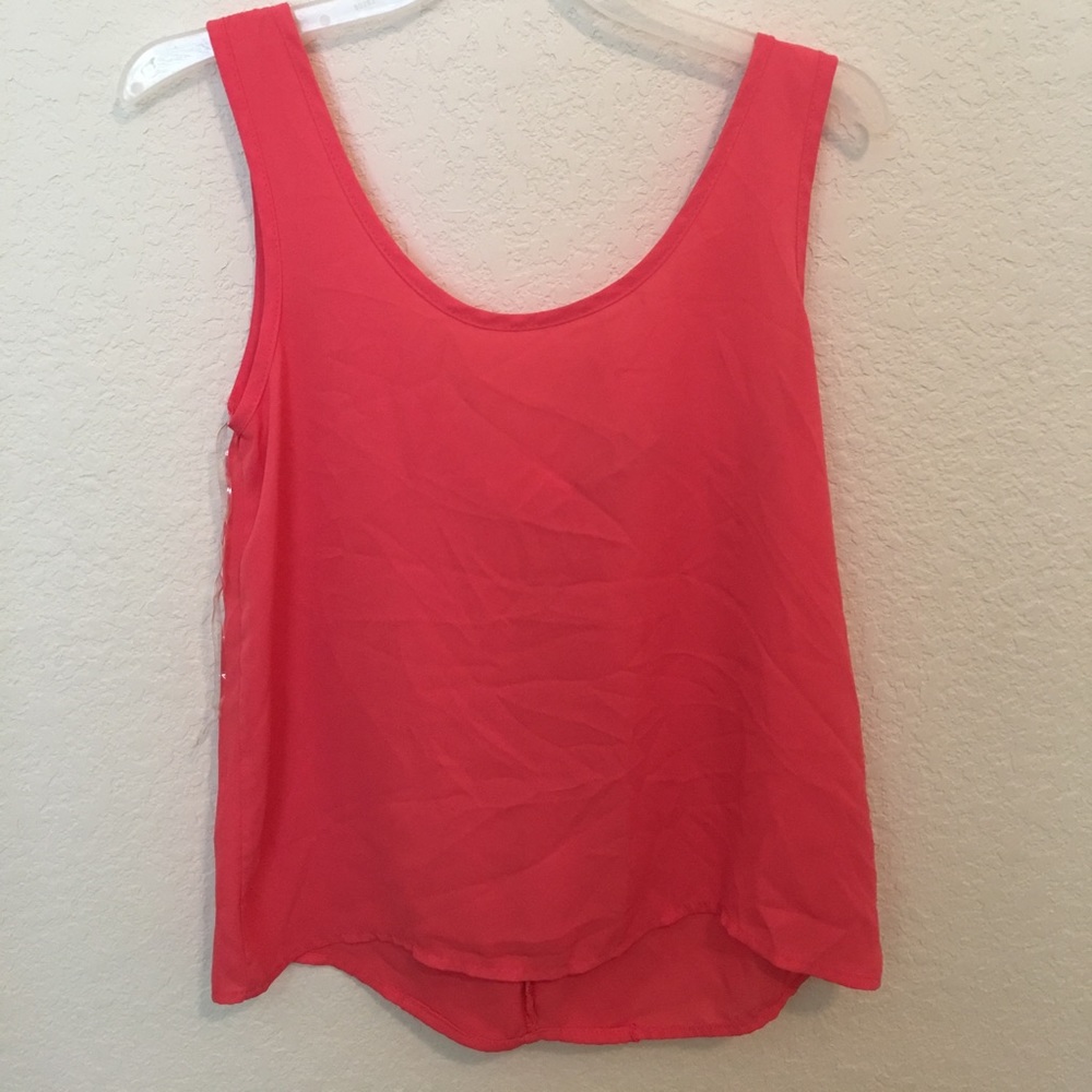 Adorable back bow coral top