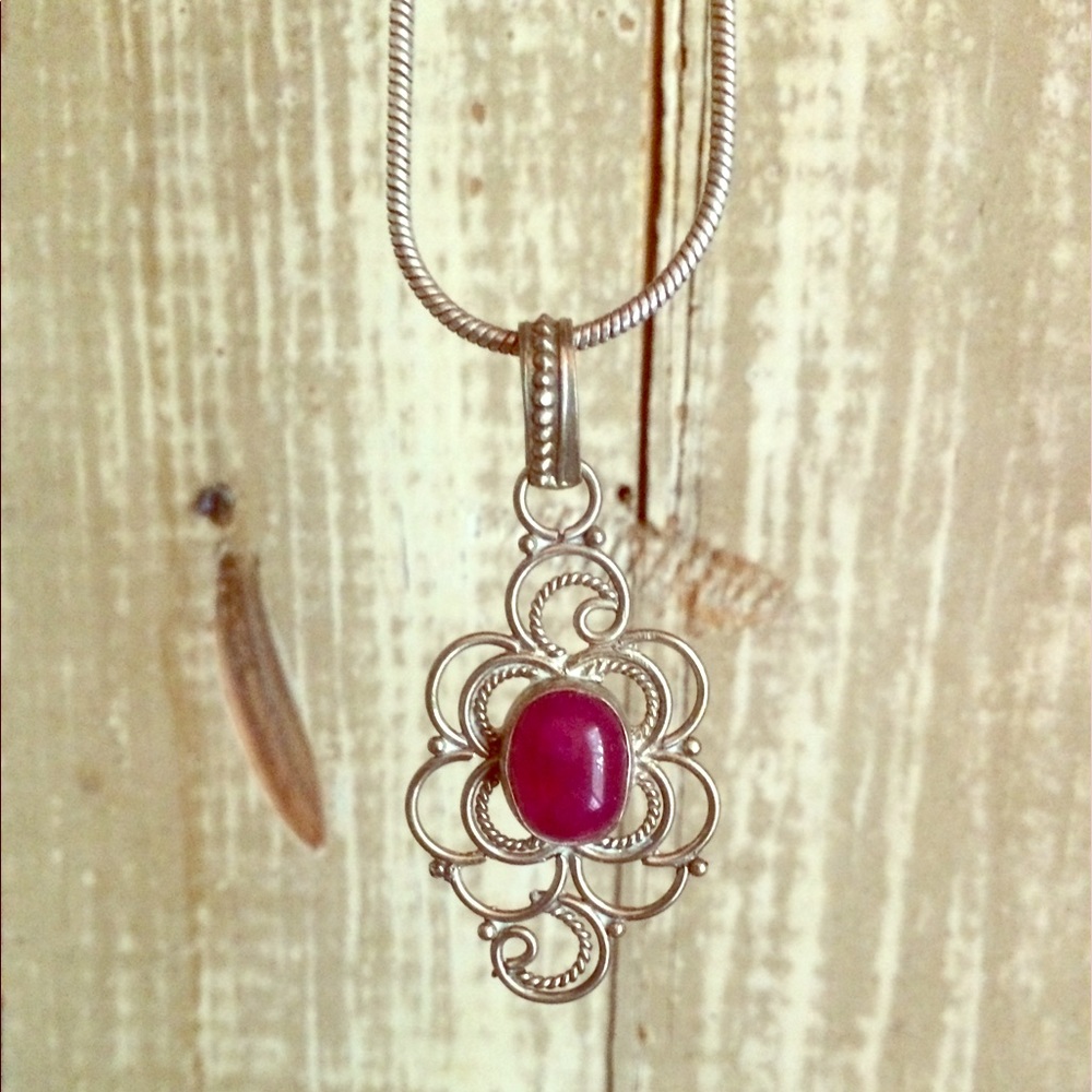 Silver necklace with artisan pendant
