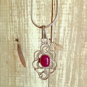 Silver necklace with artisan pendant