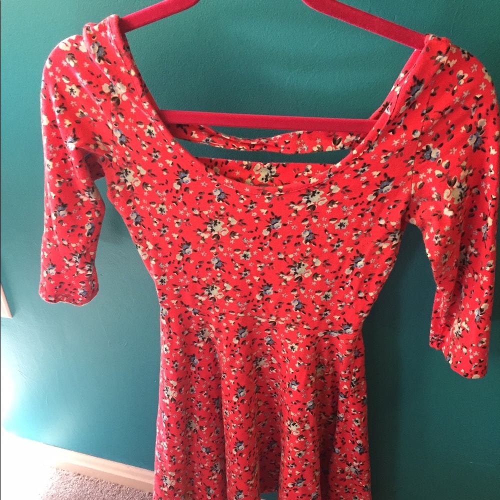 red flowing dress with flowers