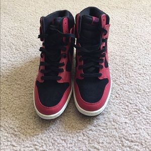 Red and black Nike wedges