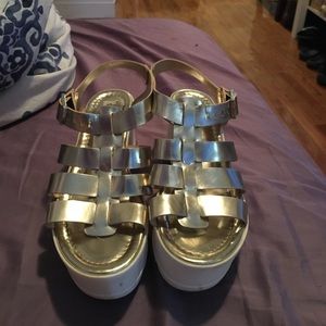 Gold and white Steve Madden platform sandals