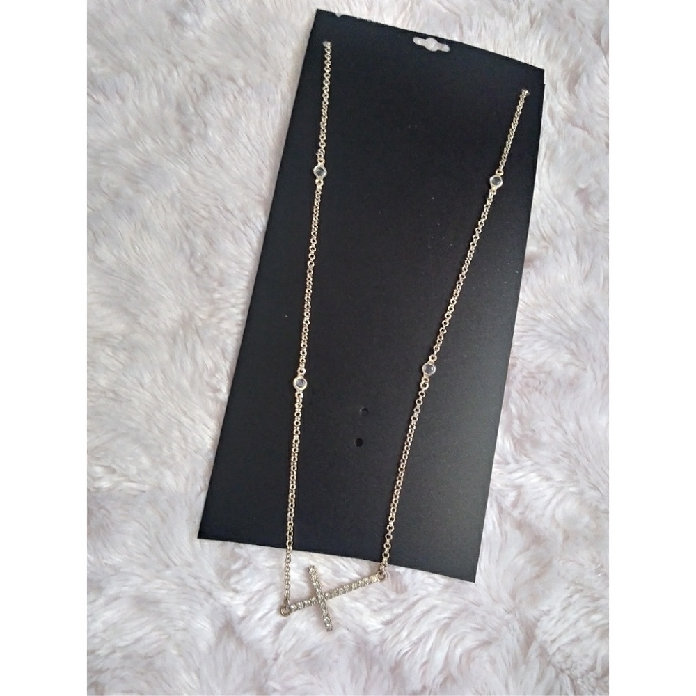 Gold cross necklace