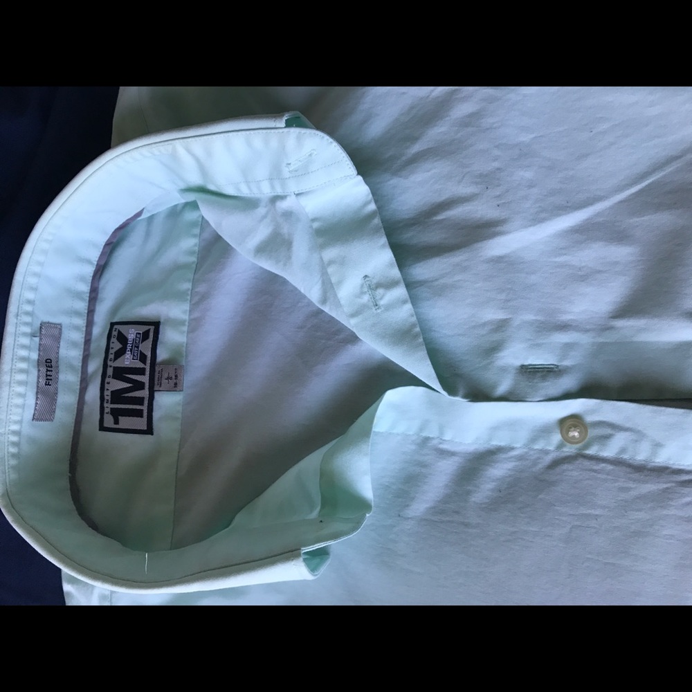 Light blue, fitted shirt