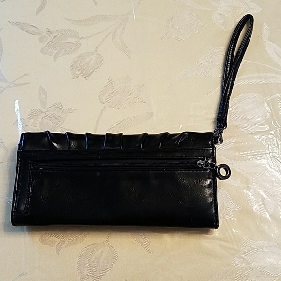 Black wristlet with small black money holder. - Picture 2 of 3