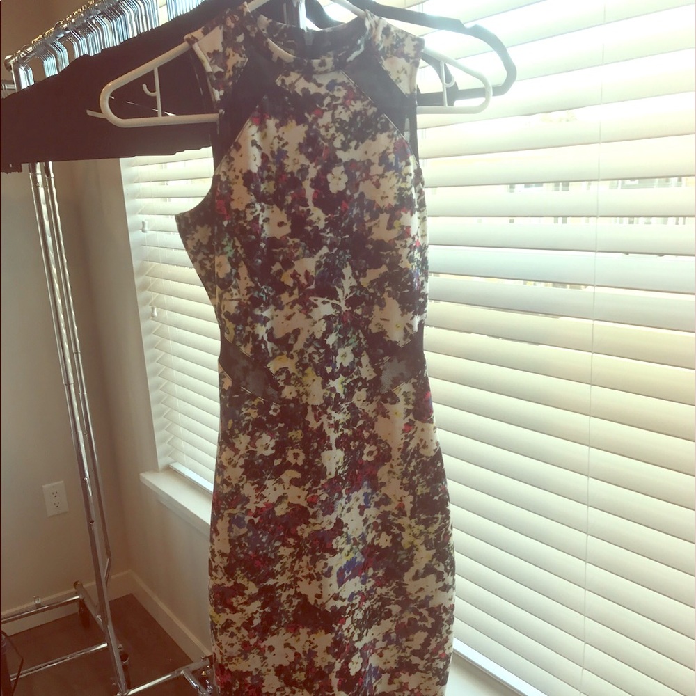 High neck, below the knee dress