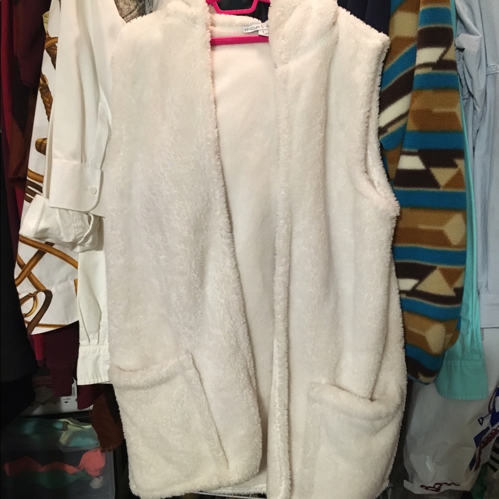 Hooded furry vest