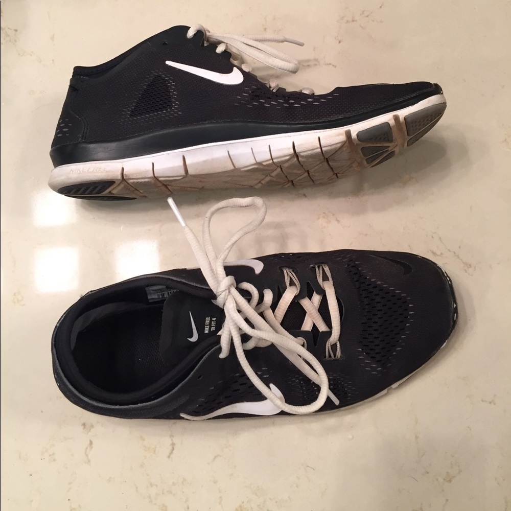 Black Nike TR FIT 4 with a white swoosh