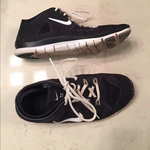 Black Nike TR FIT 4 with a white swoosh