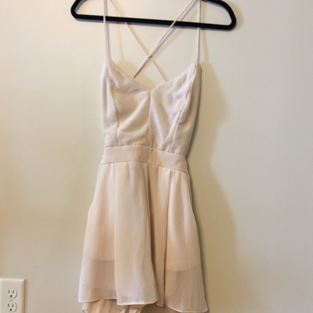 Shop Hope's Cream Cross Back Romper