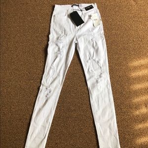 White ripped jeans