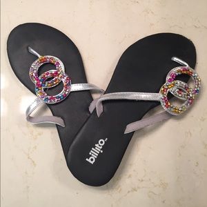 Black sandals with gem stones on top