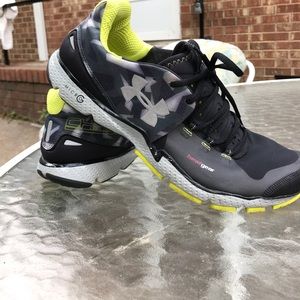 Under Armour black and yellow camouflage shoes