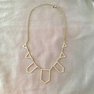 Edgy yet chic gold necklace
