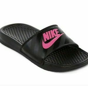 Pink and black Nike sandal