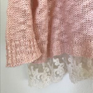 Pink sweater with lace trim