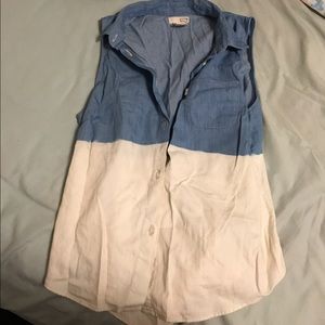 Sleeveless blue and white button up shirt