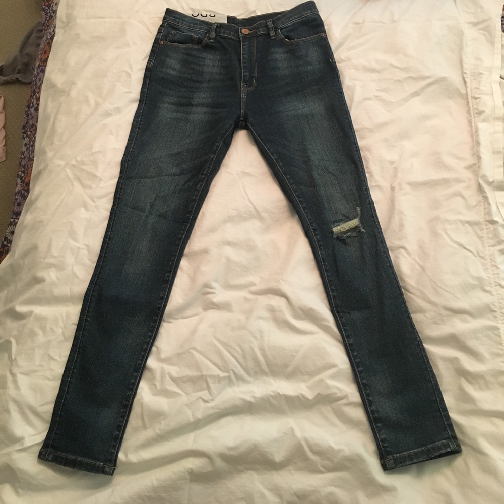Slightly torn BDG blue jeans
