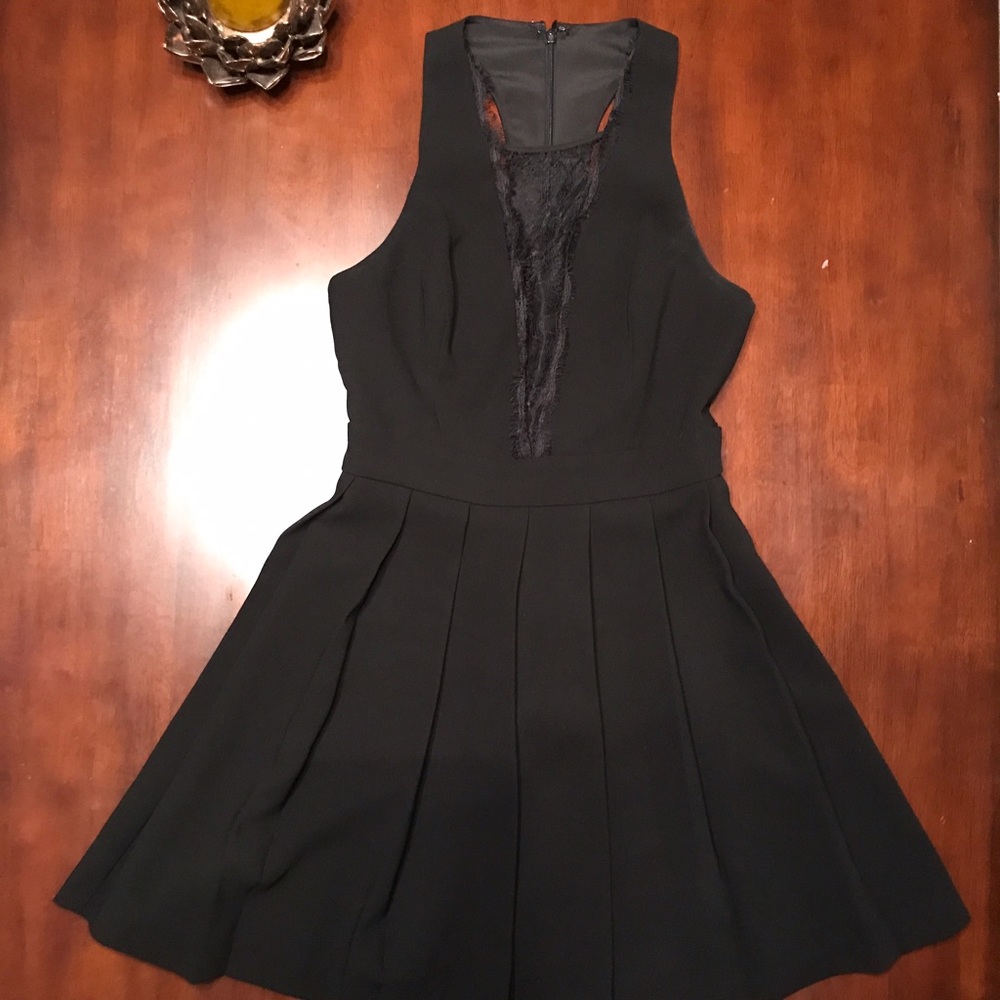 Black BCBG dress with cutout and lace detail