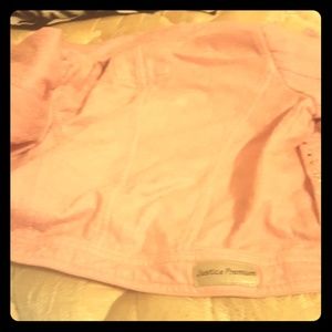 A pink justice  jacket